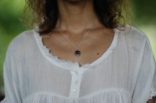 A Person Wearing a Necklace