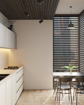 Stylish kitchen with minimalist design, wood accents and natural light.