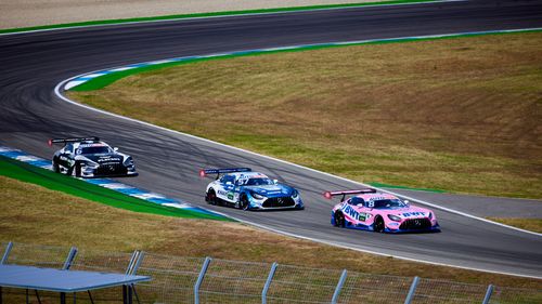 Free Exciting sports car race on Hockenheim Circuit, showcasing speed and skill on the track. Stock Photo