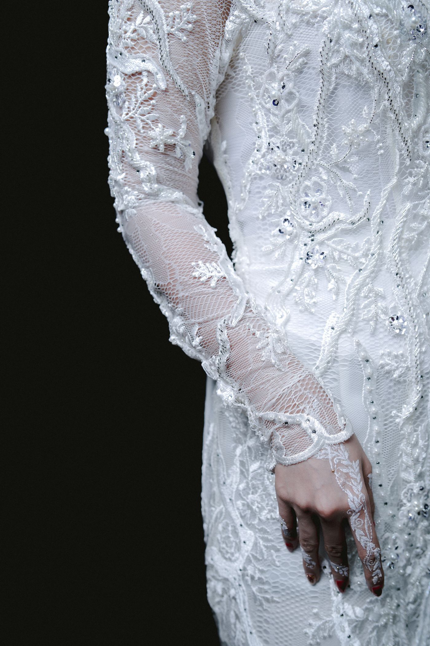 Bride in lace sleeve gown