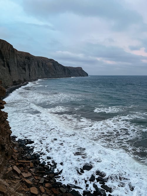 Ocean Waves Crashing on Rocky Shore