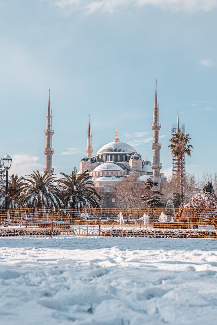 Sultan Ahmed Mosque On A Snow Covered Ground Under Blue Sky
