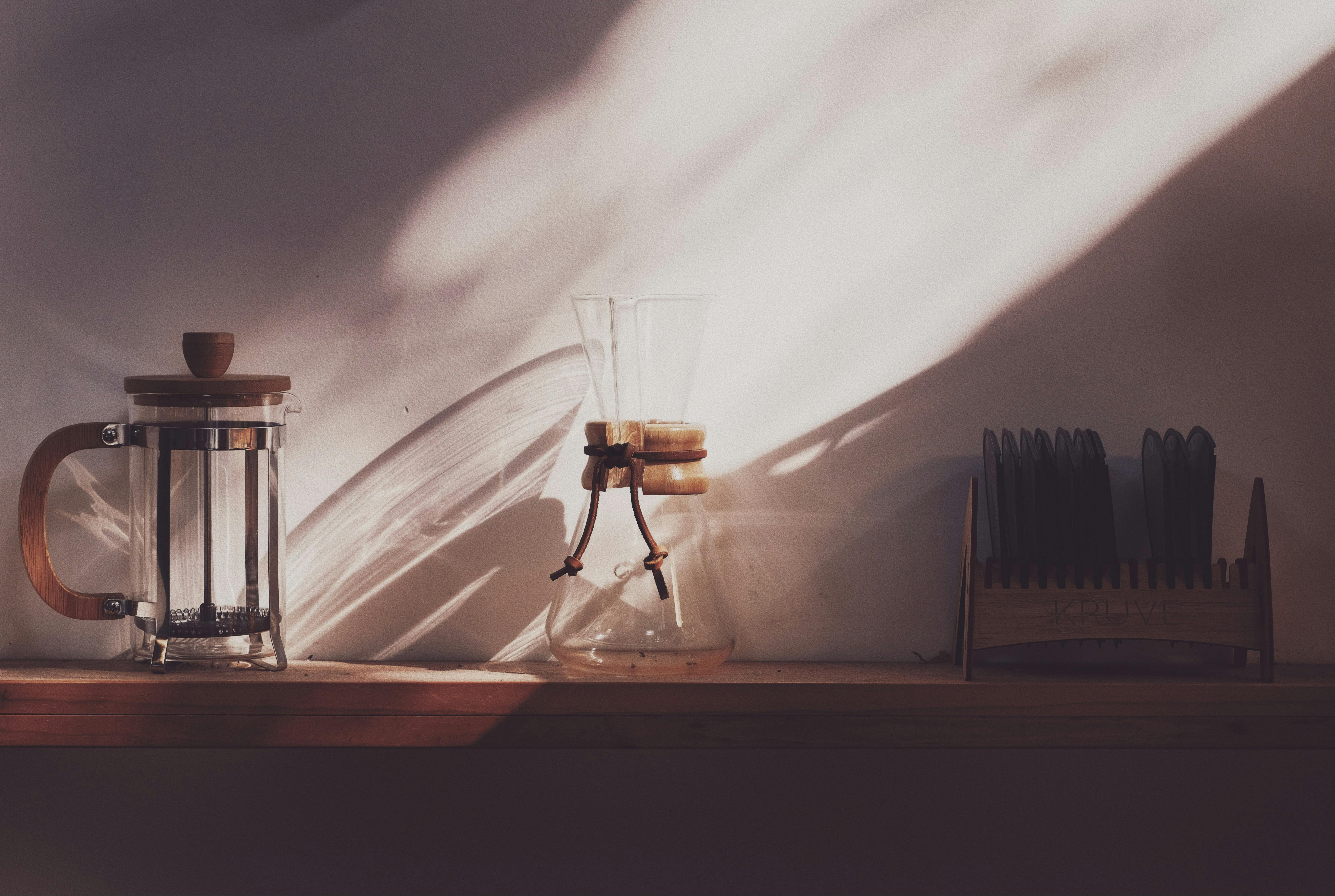 coffee equipment on a wooden shelf