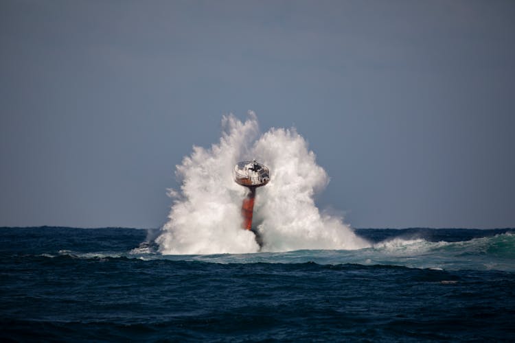 Tower Falling On Sea