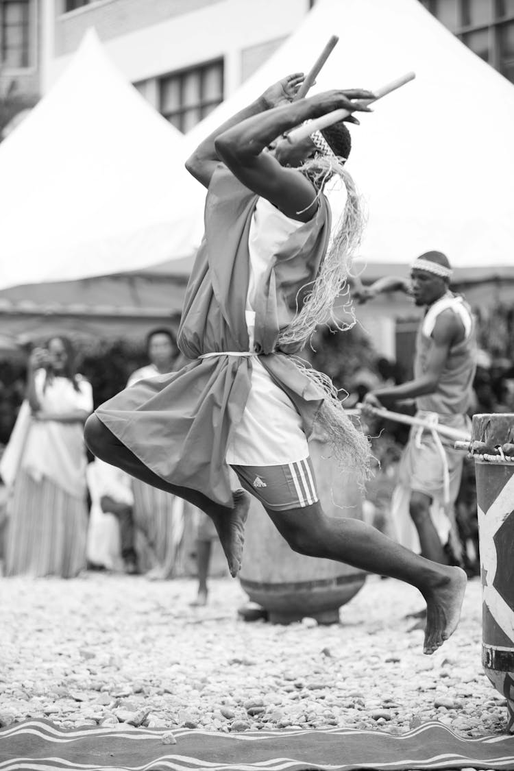 Man In Traditional Costume Dancing During Ritual