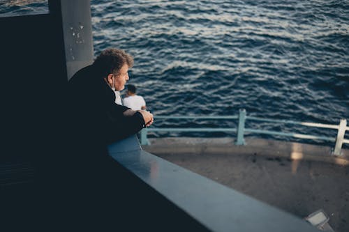 Man with Mask on Ship