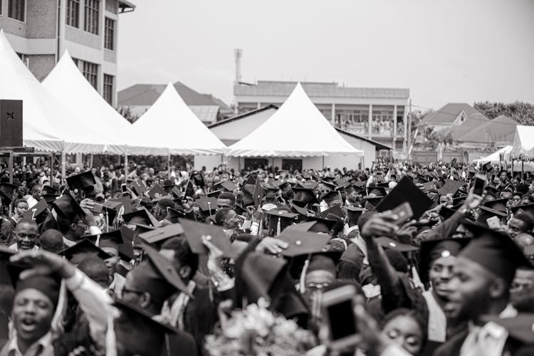Black And White Photo Of A Crowd Of Graduating Students