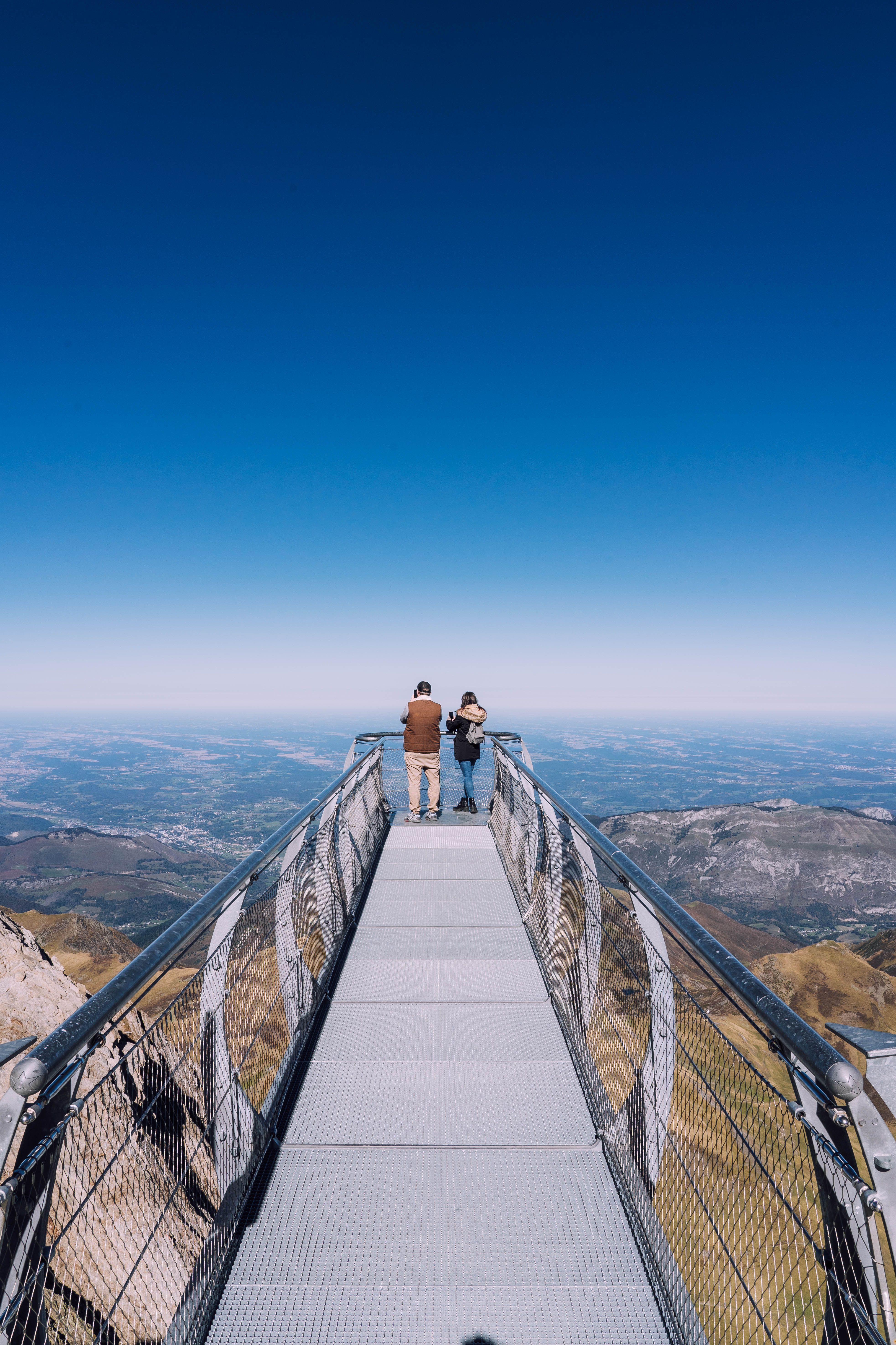 People Standing on Observation Deck in Mountains · Free Stock Photo