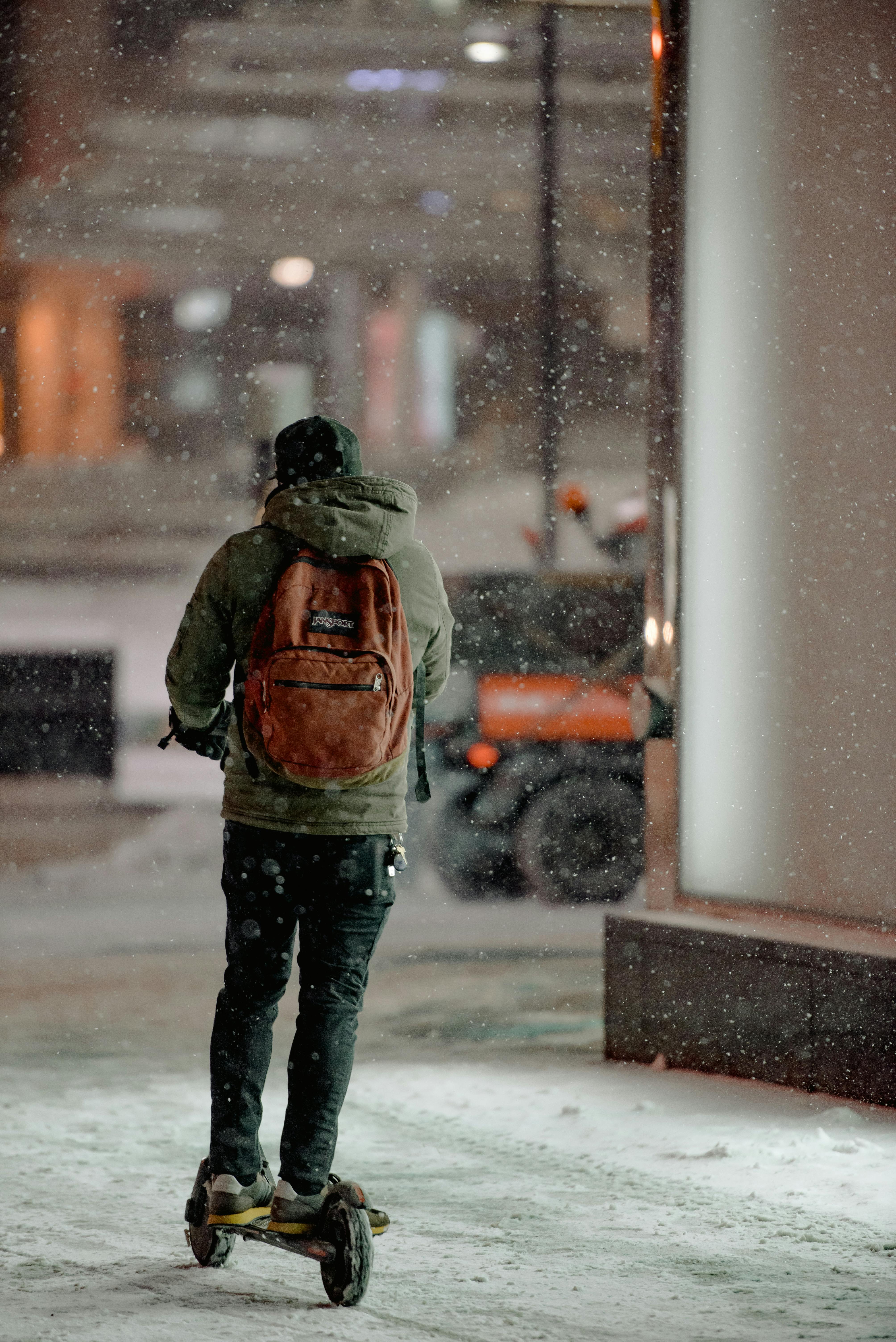 Snow-covered mobility scooter in winter conditions