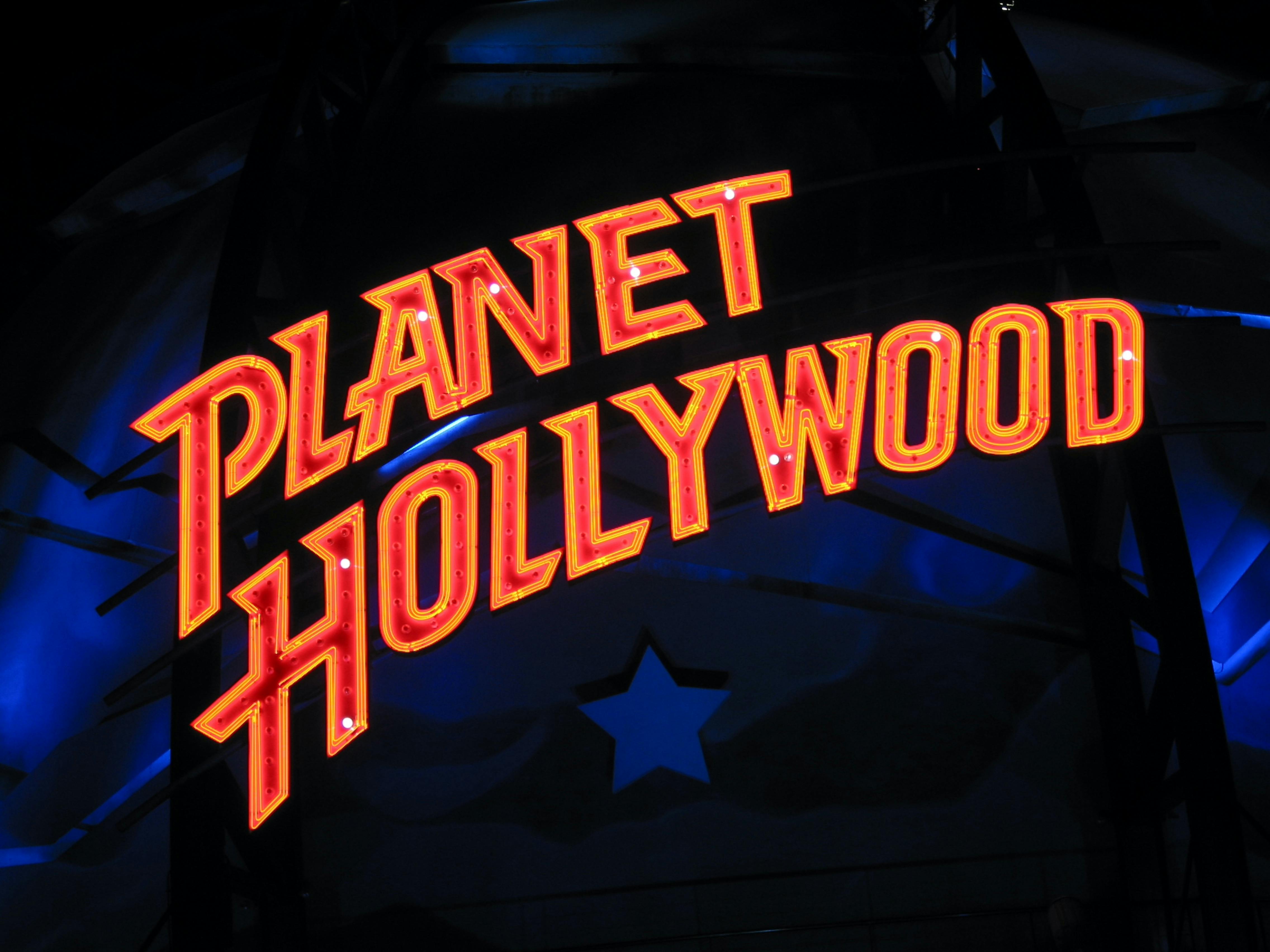 planet hollywood logo sign