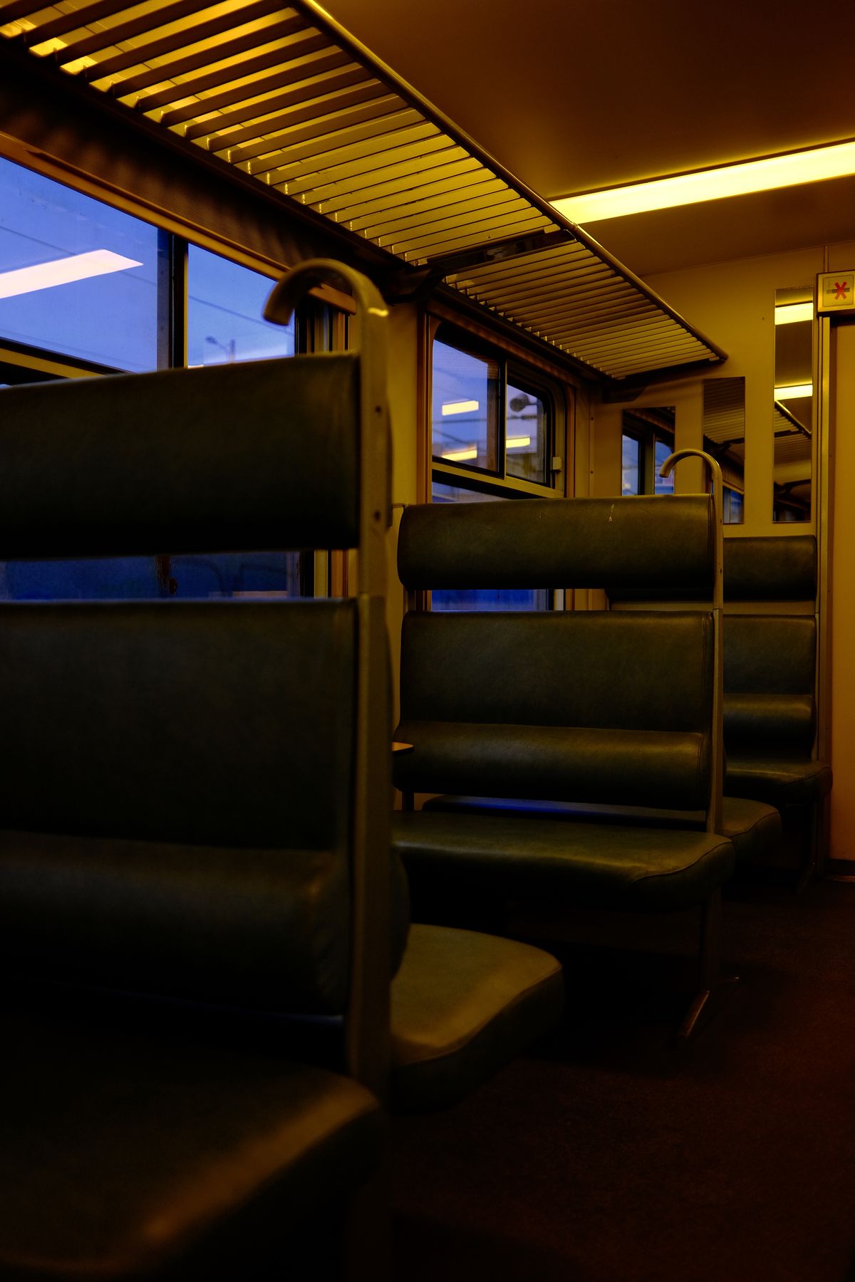 Empty seats inside a vintage night train carriage