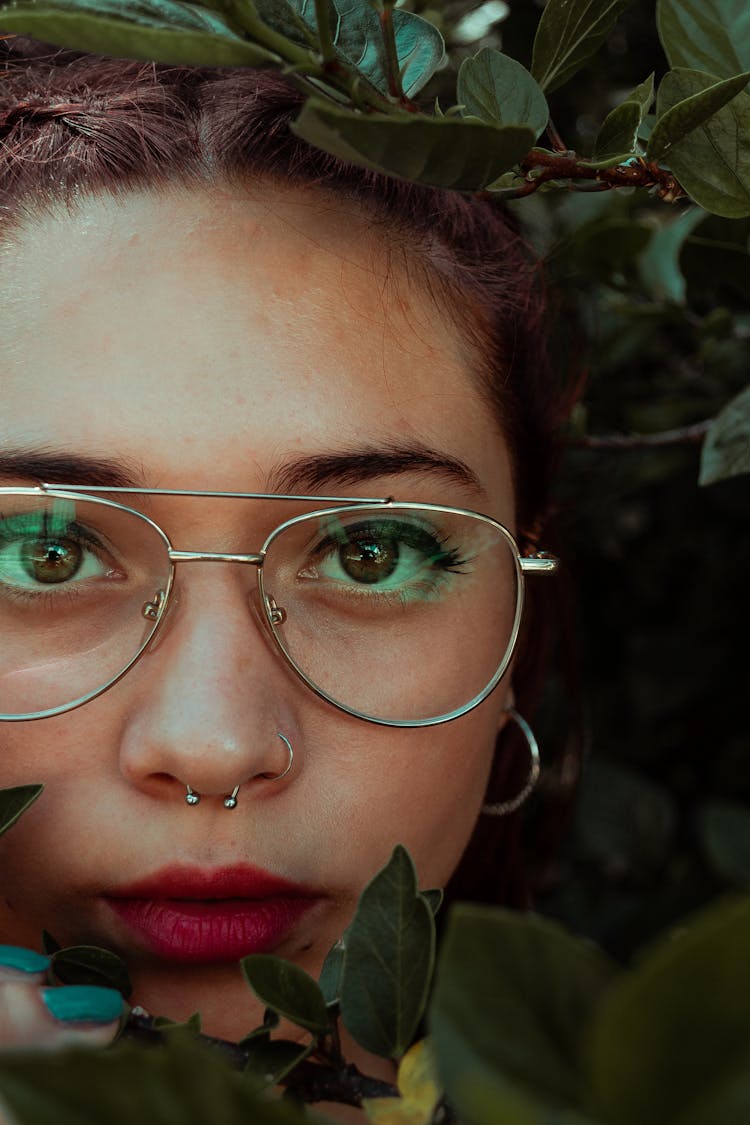 Woman In Glasses In Garden