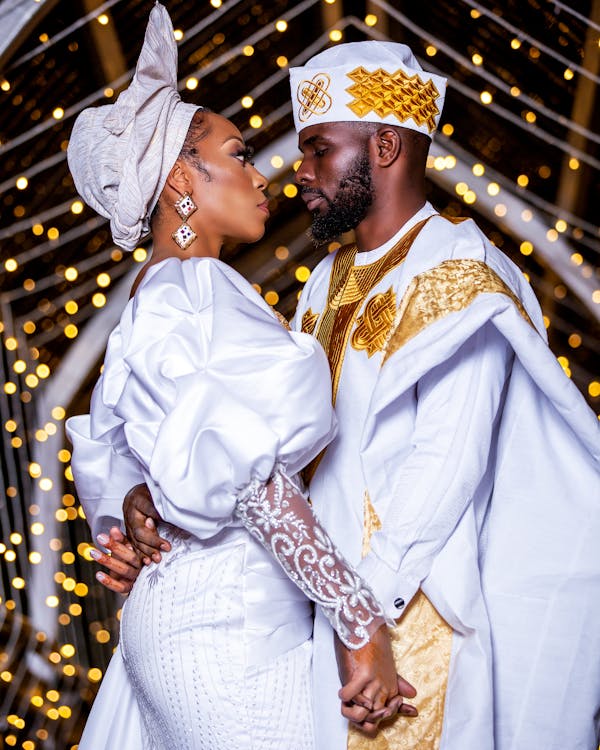 A Bride and Groom Wearing Traditional Wedding Clothes Free Stock