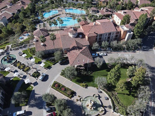 Drone Shot of Parked Cars outside a Resort