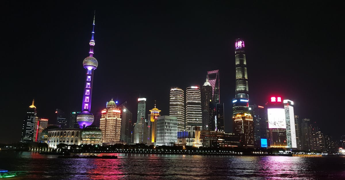 High-rise Buildings at Night · Free Stock Photo