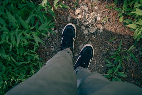 Free Person in Gray Pants and Black and White Sneakers Stock Photo