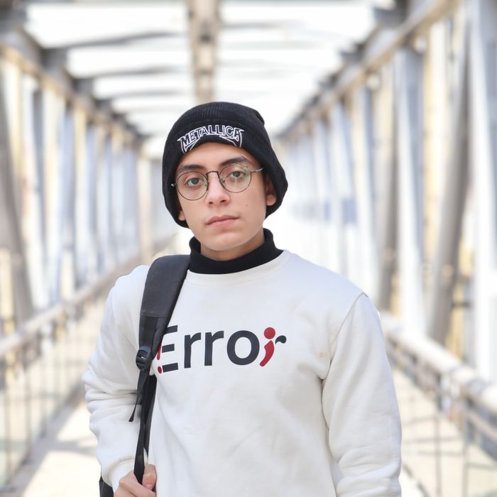 A person wearing a knitted beanie — photo by Ahmed Aziz on Pexels