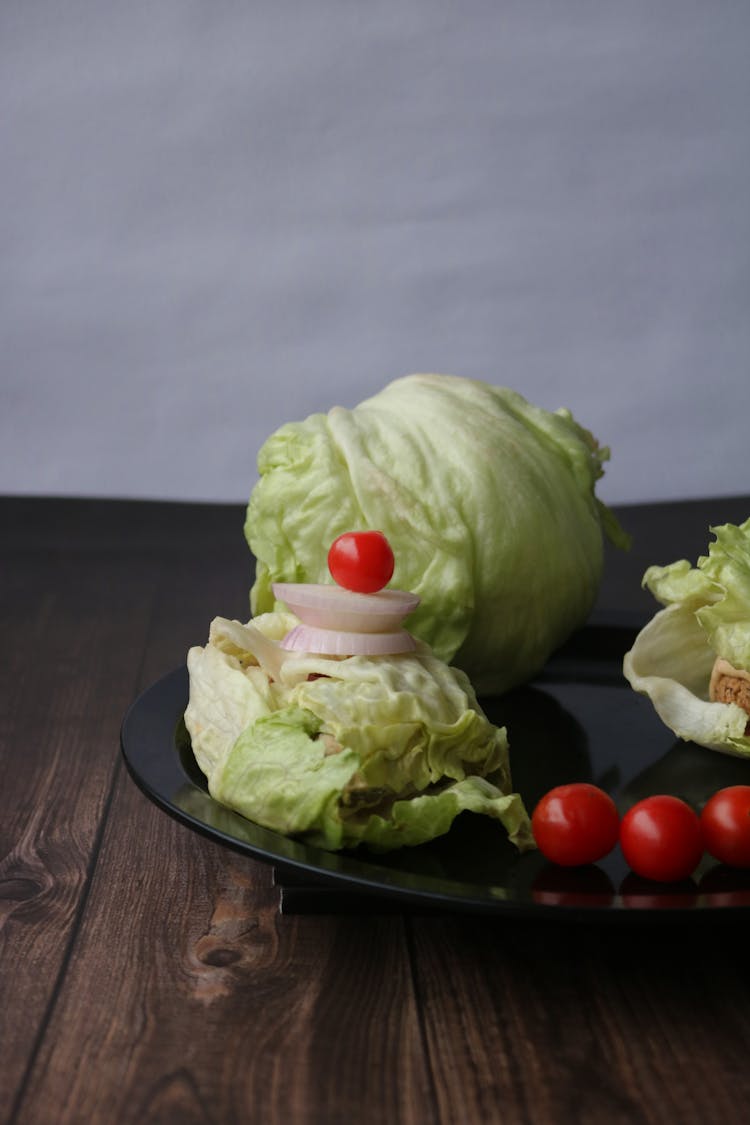 Fresh Lettuce And Cherry Tomatoes On A Plate