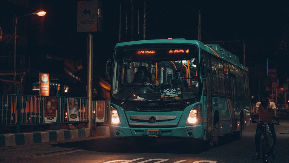 A modern public bus from Bahrain Public Transport Company on a street in Bahrain