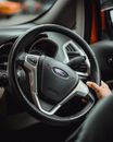 Person Holding Black Car Steering Wheel