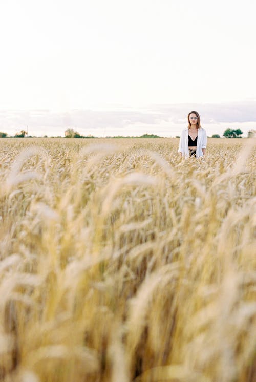  Woman Standing on the Wheat Field