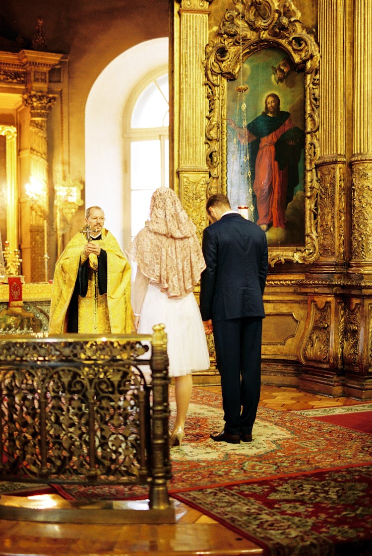 Priest Preforming Orthodox Wedding Ceremony