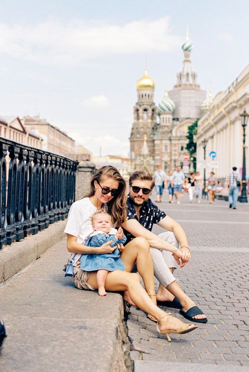 Free A family enjoying a sunny day near the Church of the Savior on Spilled Blood. Stock Photo