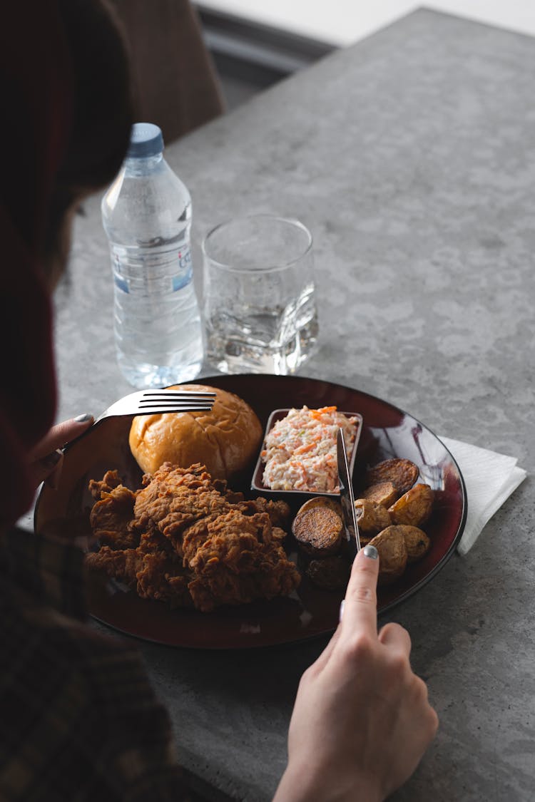 Woman Eating Fried Chicken