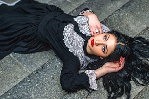 A Woman Lying Down on the Floor 