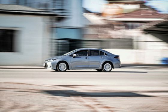 Silver compact sedan in profile — Abdulvahap Demir on Pexels