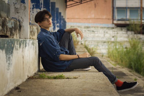 Side View of a Man While Sitting 