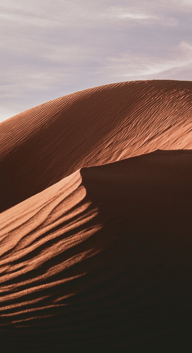 Brown Desert Sand Under The Sky