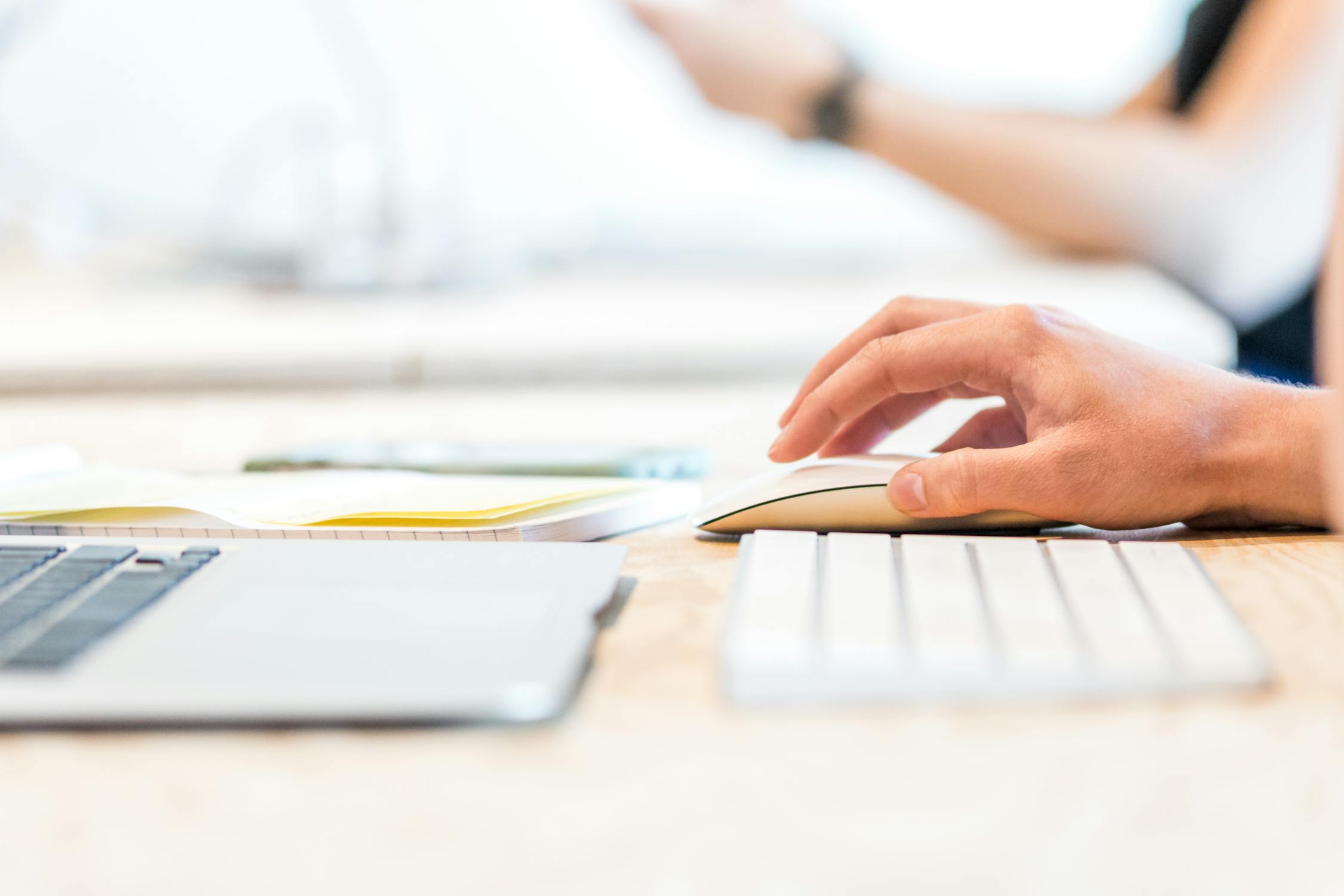 work in front of a laptop and keyboard