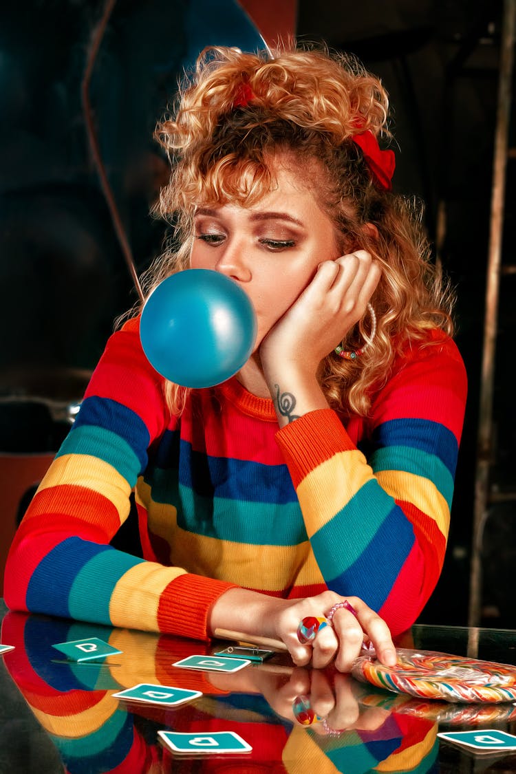 Woman In Sweater With Bubblegum 