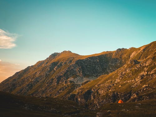 A Mountain Landscape under a Clear Blue Sky