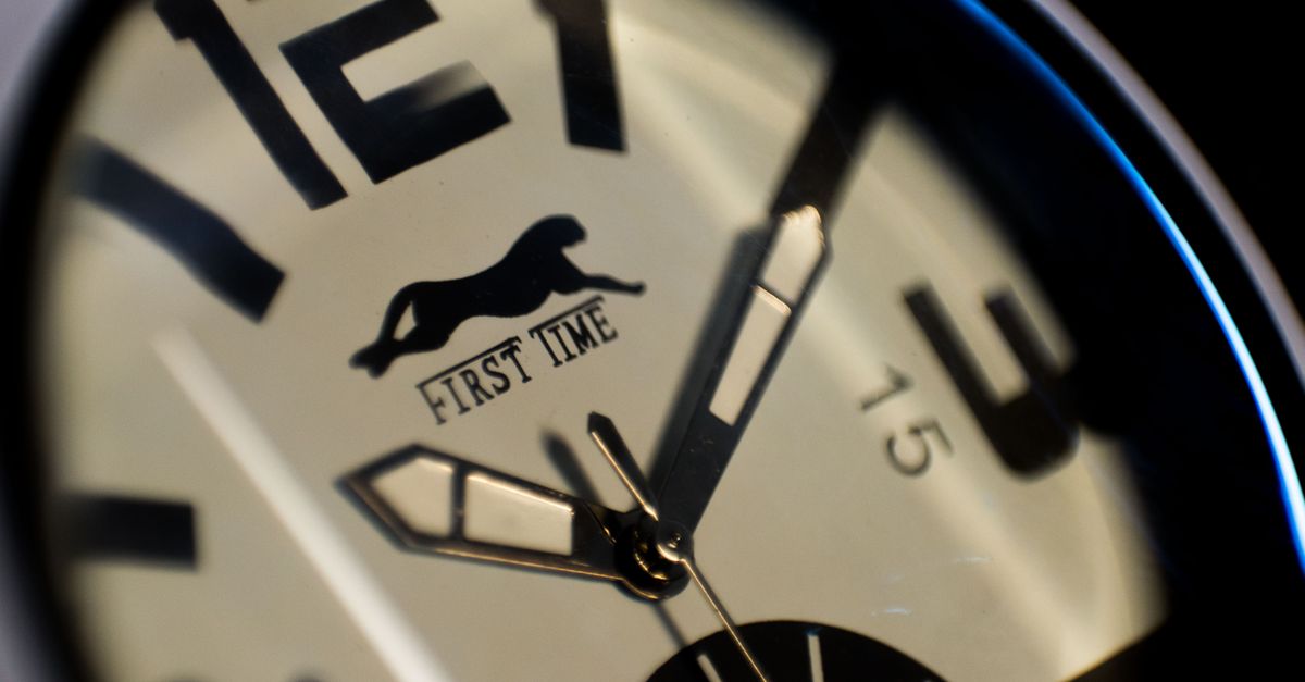 close up of shot clock showing 12 seconds with intense player face