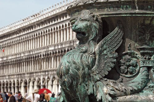 Close-up of a Statue of Winged Lion on the Building