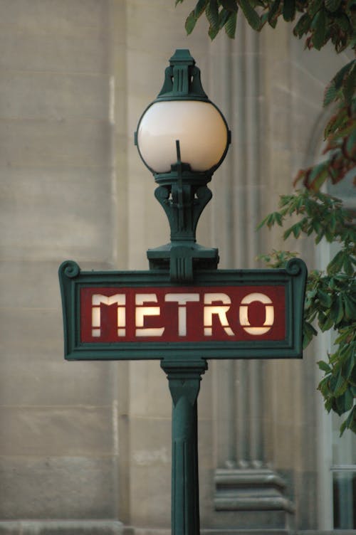 A Road Sign on a Streetlight