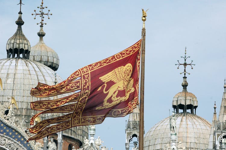 Banner With Griffin In Front Of Church