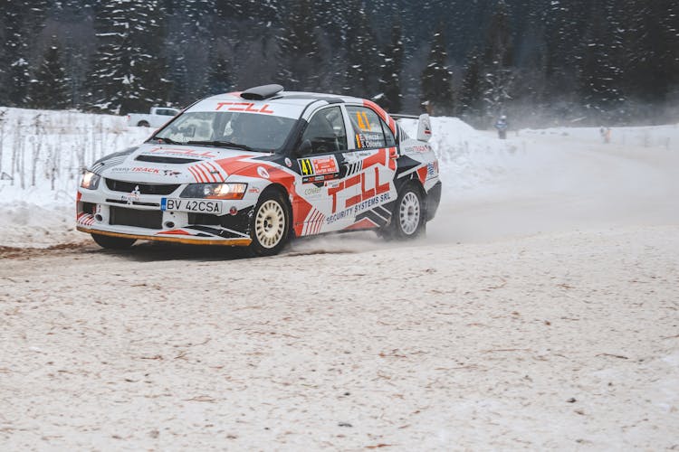 A Mitsubishi Lancer Evolution Doing Rally Racing 