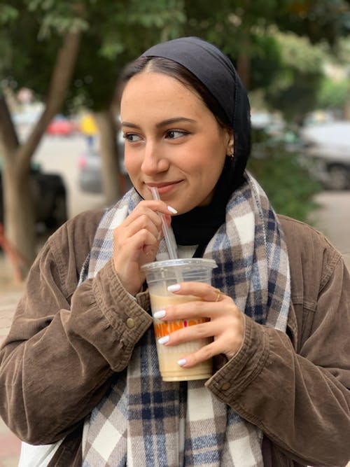 Woman Drinking Cofee