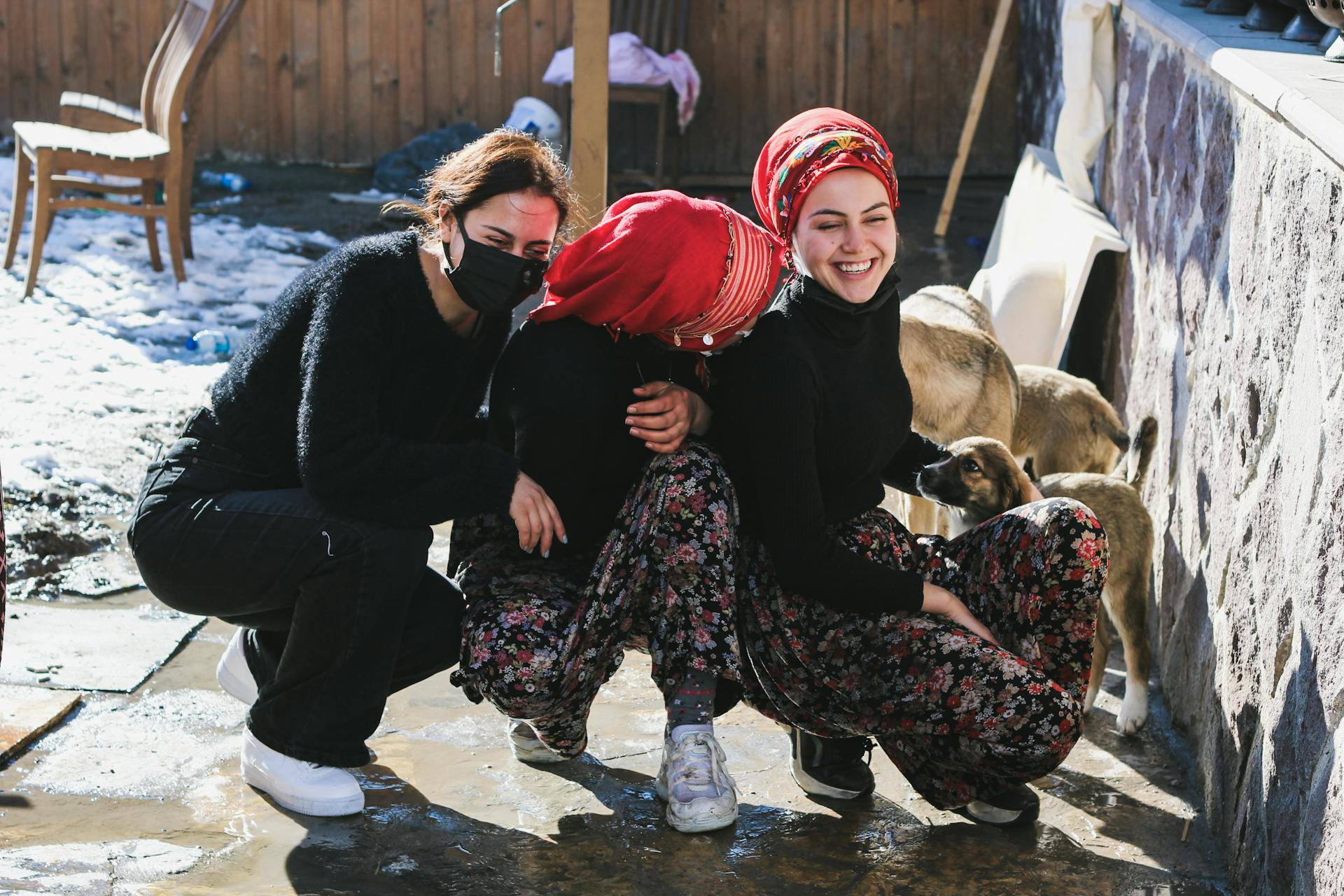 Smiling Women with Dogs