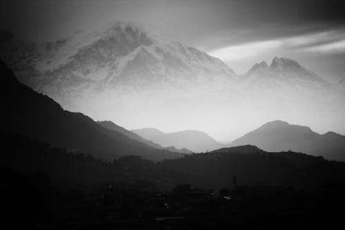 Grayscale Photo of Mountains