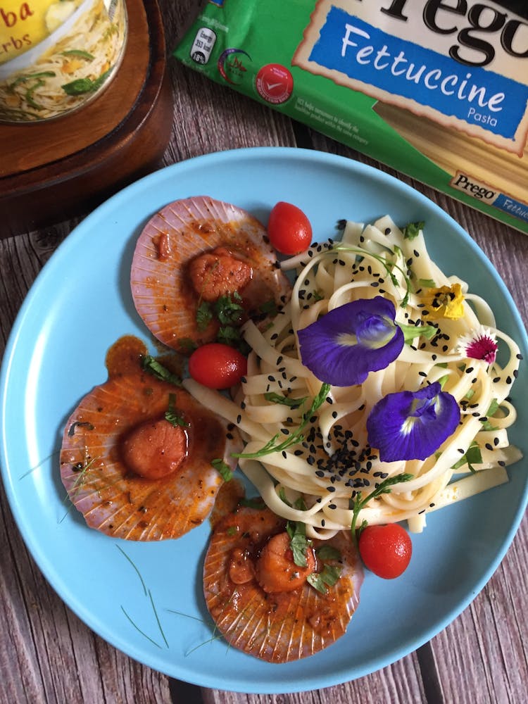 Scallops And Pasta On Blue Ceramic Plate 