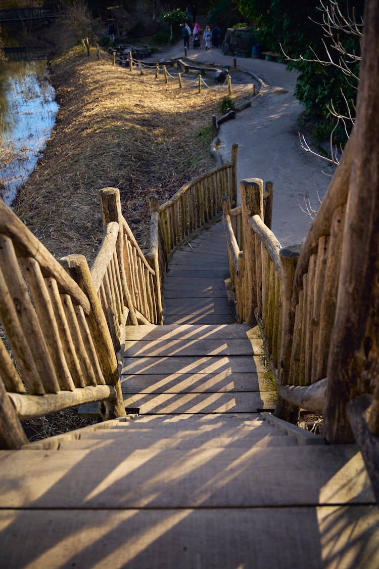 Brown Wooden Stairs Near River