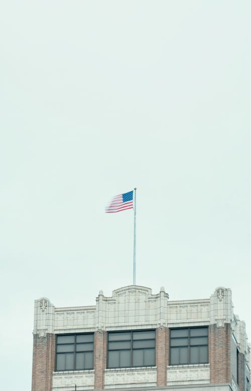 Photo of a Building with an American Flag