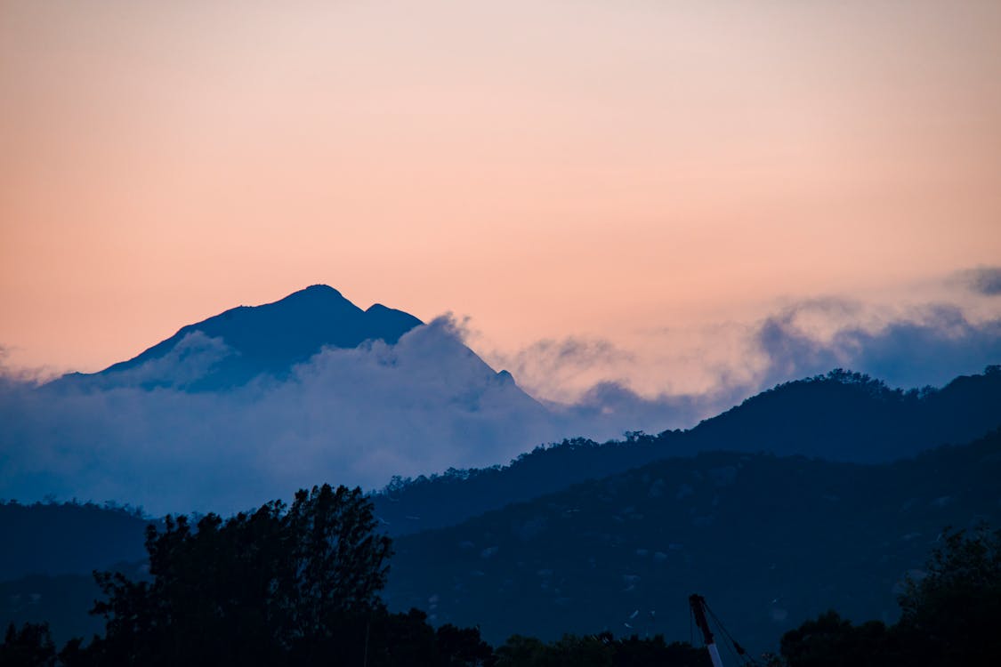 Silhouette Of Mountain During Sunset