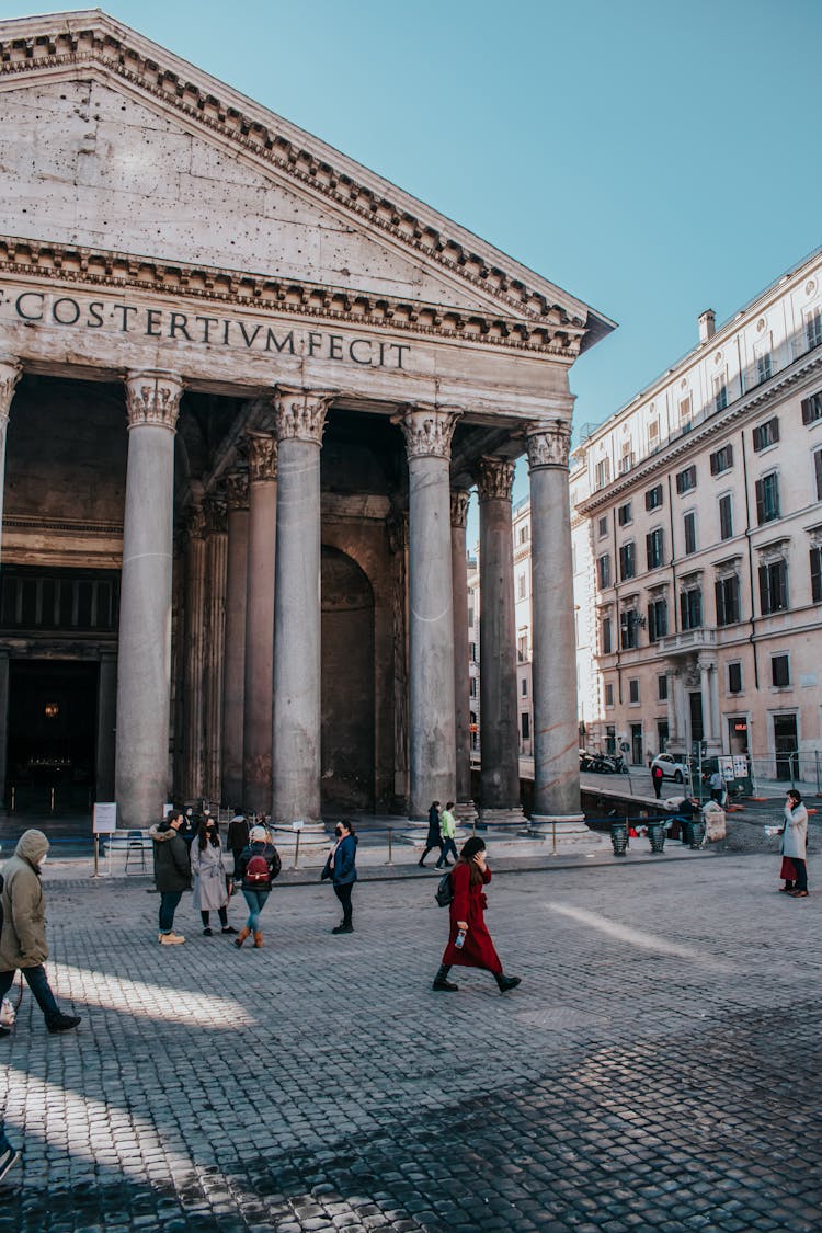 People Walking On Street Near Building