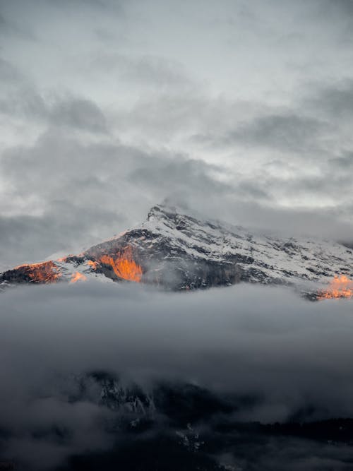 Clouds over Mountains Peaks