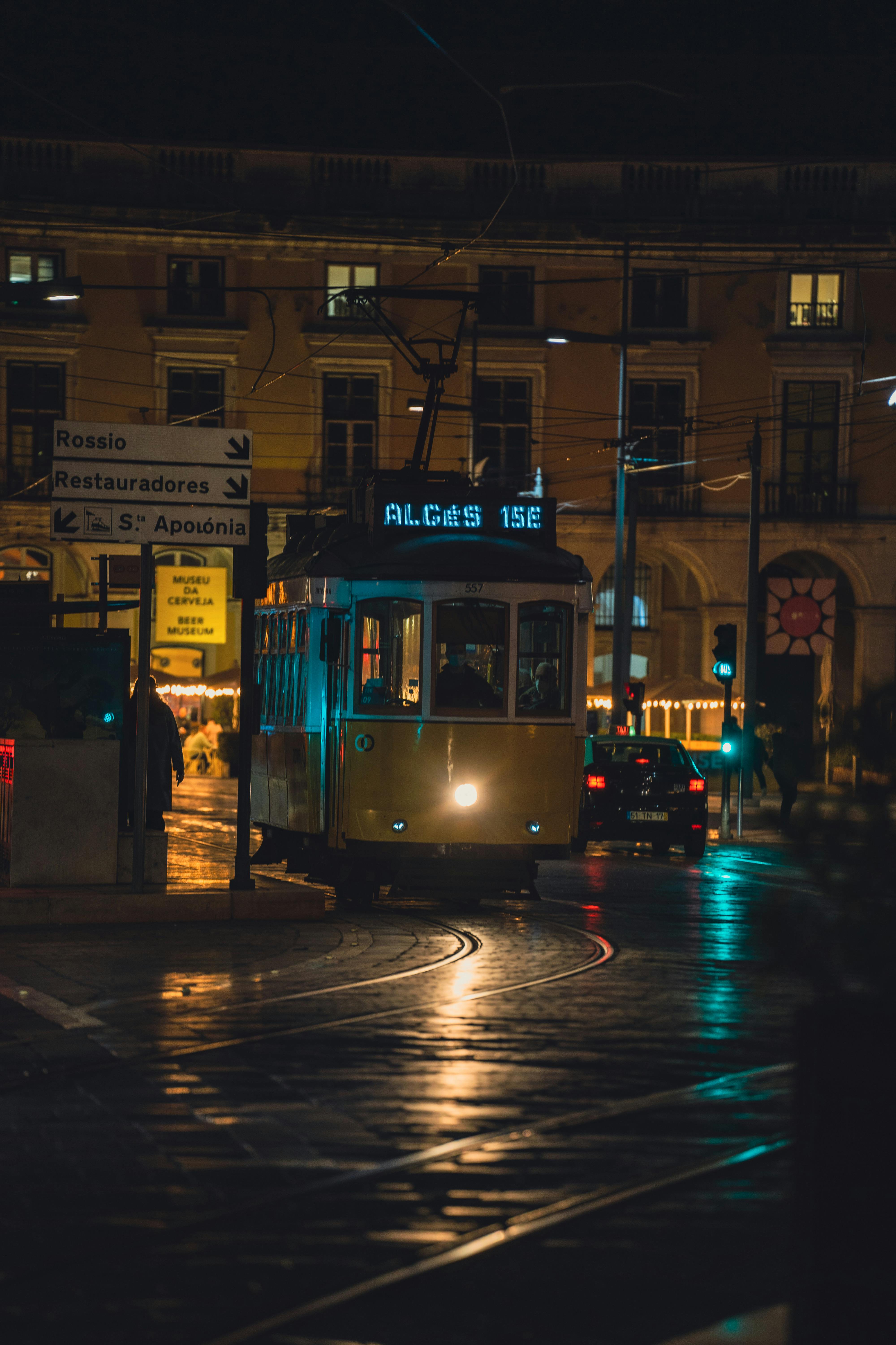 a tram on the street at night